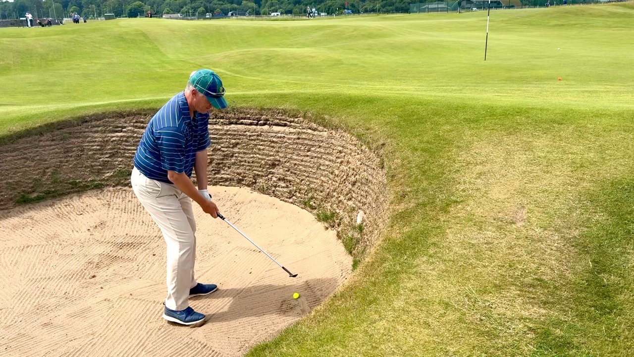 how to get the ball out of the bunker, step 4, aim your body 30 degrees to the left of the target.