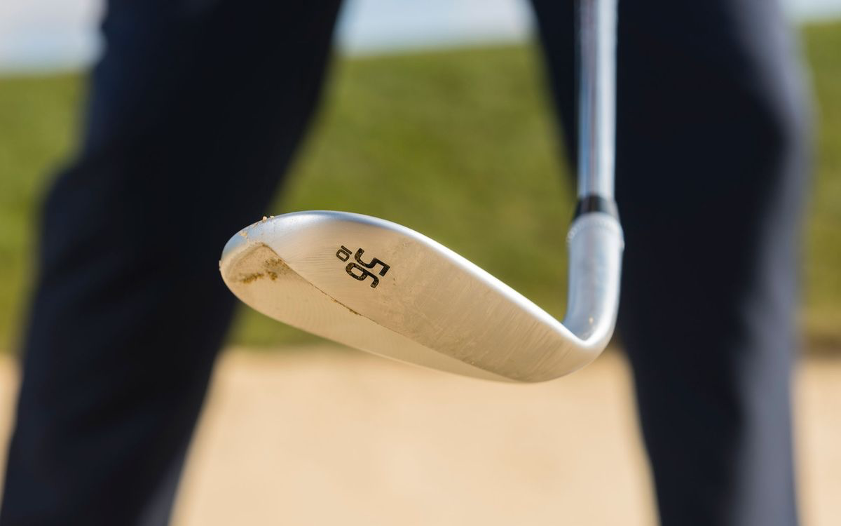 how to get the ball out of the bunker, step 3, open your clubface